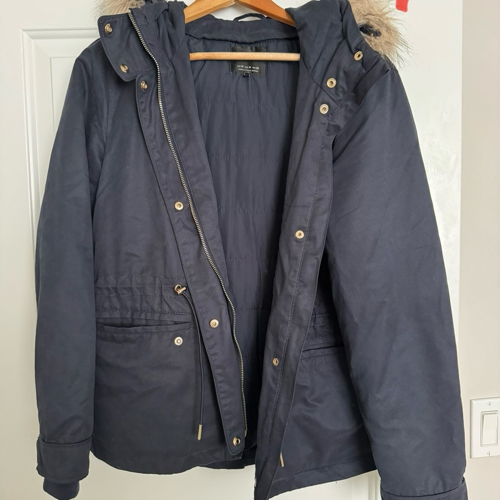 Warm navy jacket with fur hat